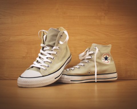 brown Converse high top shoes