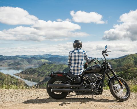 man sitting on the motorcycle