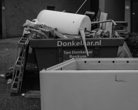 A black and white photo of a pile of trash