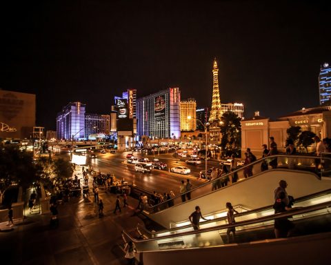 people walking on street during night time